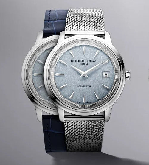 Frederique Constant Moneta Solarmetre by Frederique Constant with ice blue dial, silver tone case, date window, and mesh bracelet